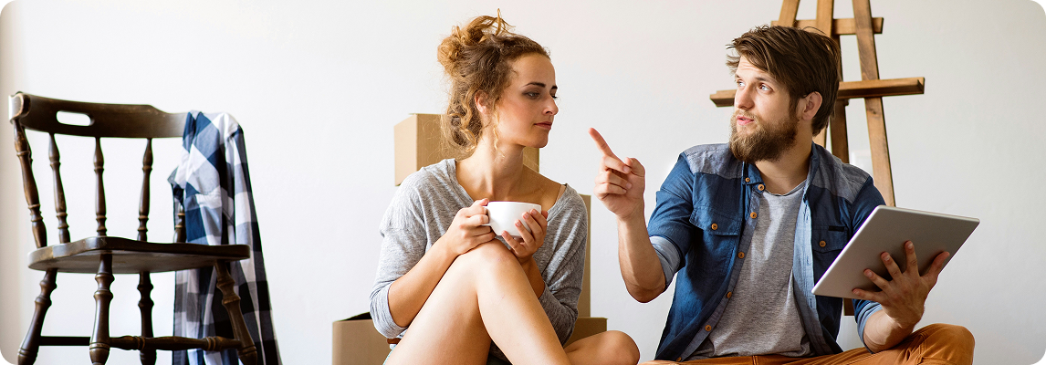 Couple consulting on health insurance solutions with simply